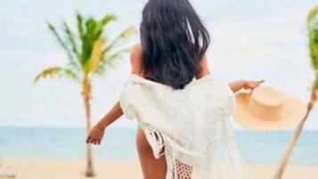 Guests can enjoy a refreshing dip in the pool overlooking the ocean.