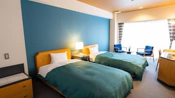 Escritorio, wifi gratis y ropa de cama