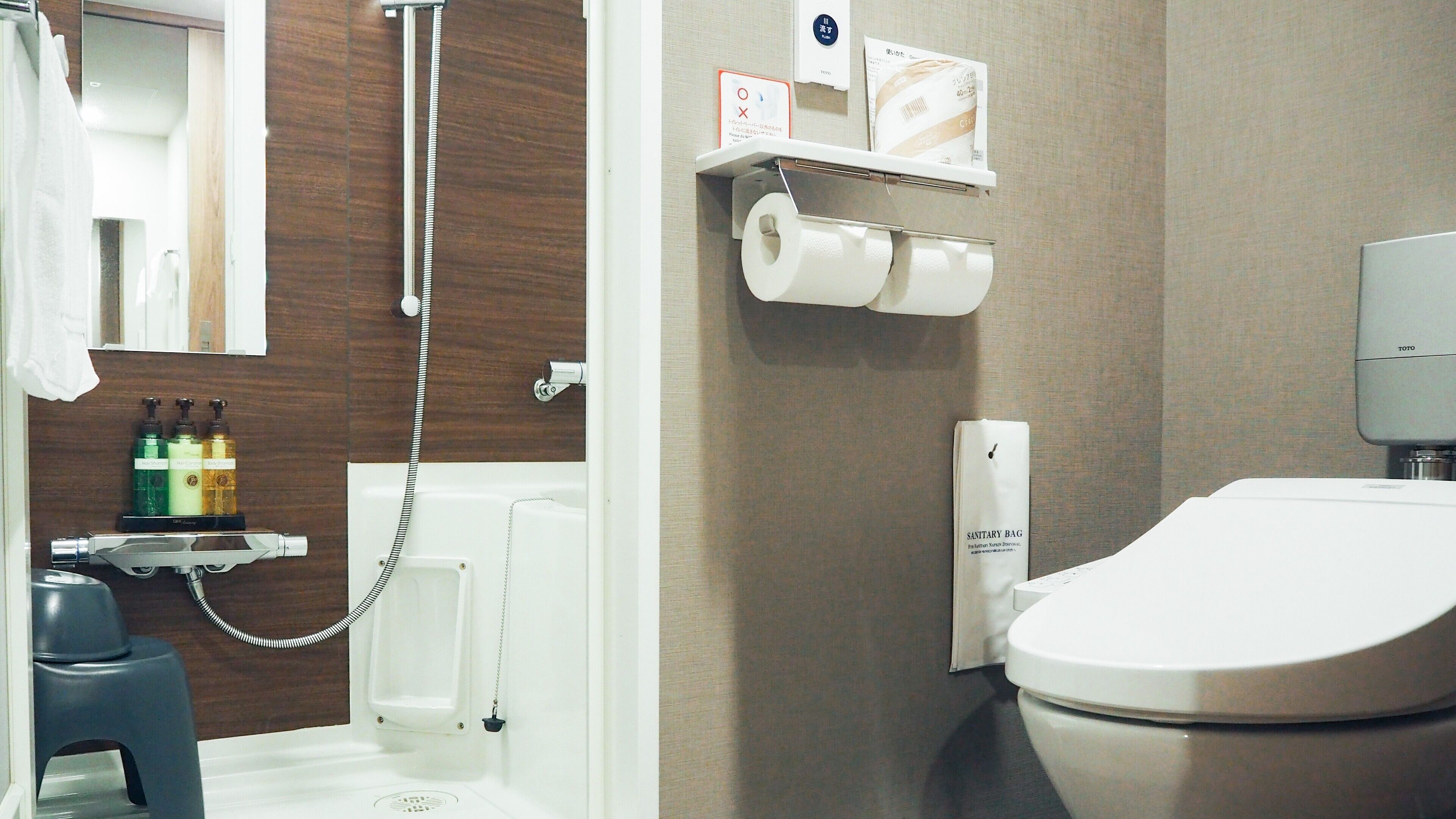 combined shower/bathtub, free toiletries, hair dryer, slippers