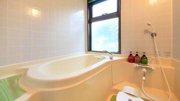 Family Cottage, 1 Bedroom, Smoking, Kitchen | Bathroom | Combined shower/bathtub, deep-soaking bathtub, free toiletries