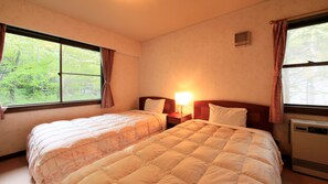 Family Cottage, 1 Bedroom, Smoking, Kitchen | 2 bedrooms, desk, bed sheets