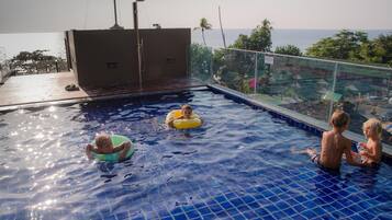 Outdoor pool, pool umbrellas, pool loungers