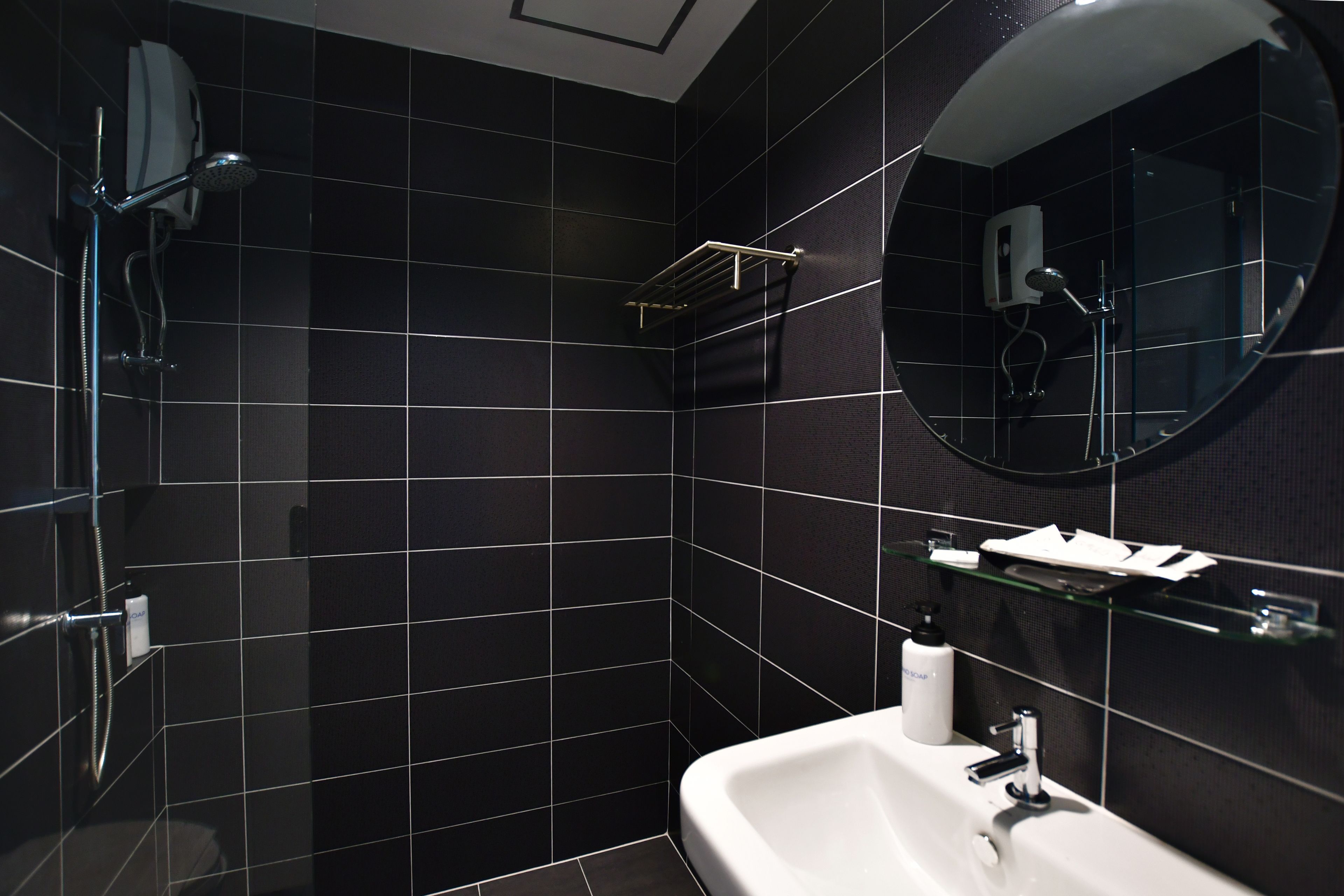 deep-soaking bathtub, free toiletries, hair dryer, bathrobes