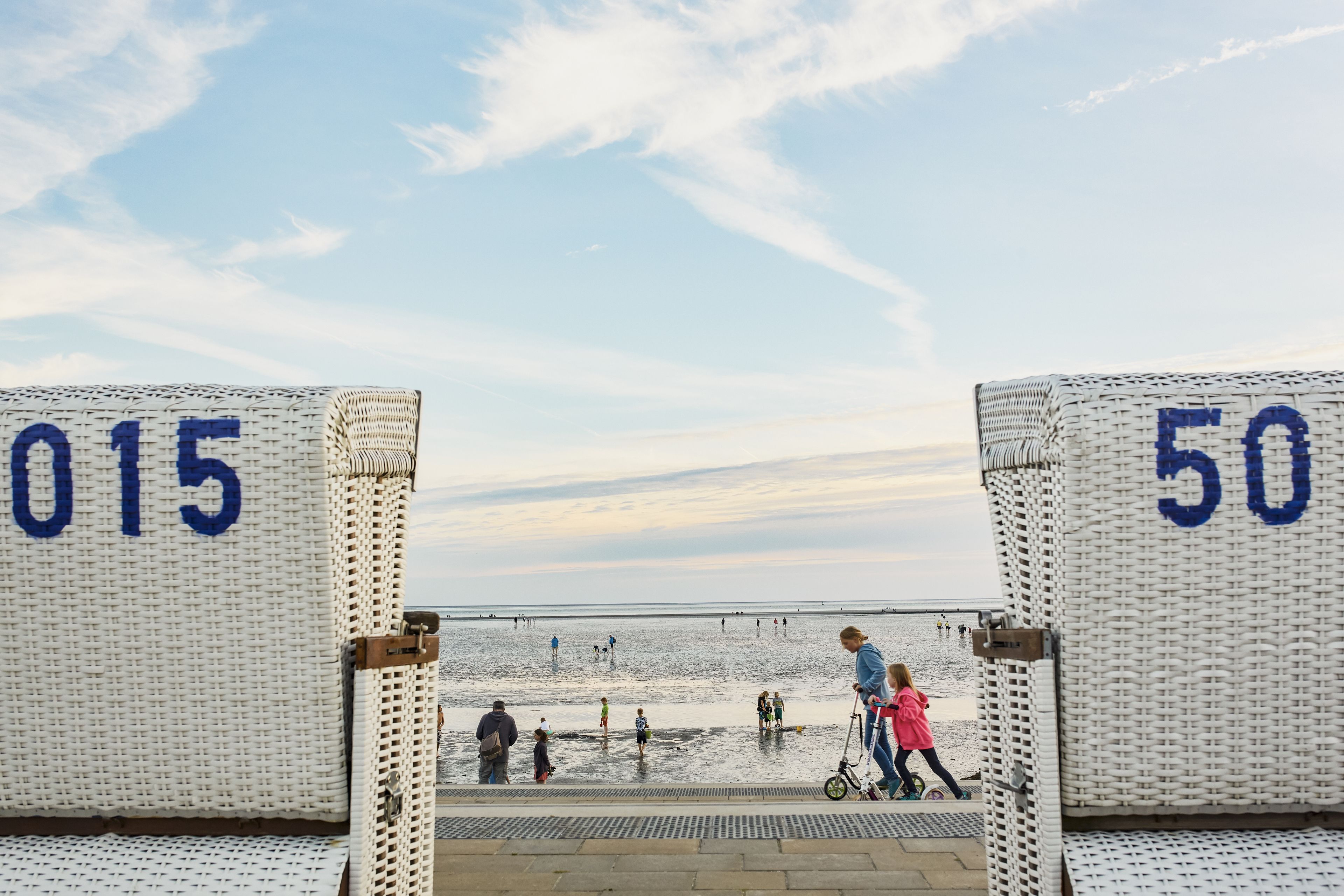 A beach entrance with numbered gates 015 and 50.
