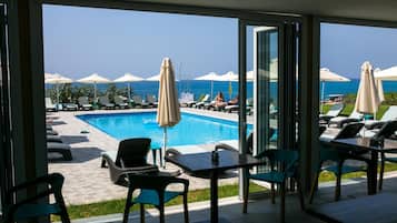 Outdoor pool, pool umbrellas, pool loungers