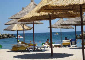 On the beach, white sand