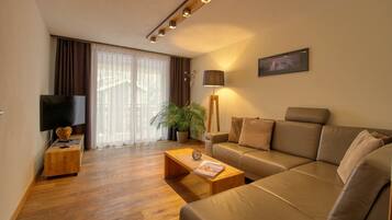 Luxury Apartment, 2 Bedrooms, Mountain View, Mountainside | Living area | Flat-screen TV, DVD player, ping pong, heated floors