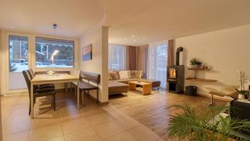 Luxury Apartment, 3 Bedrooms, Accessible, Garden Area | Living area | Flat-screen TV, DVD player, ping pong, heated floors