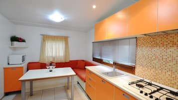 City Bungalow, 2 Bedrooms | Living area | LCD TV, table tennis