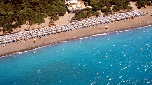 Private beach nearby, beach umbrellas