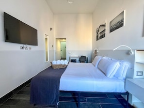Double Room, Balcony | Minibar, in-room safe, desk, iron/ironing board
