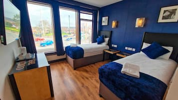 Standard Quadruple Room | Iron/ironing board, free WiFi, bed sheets