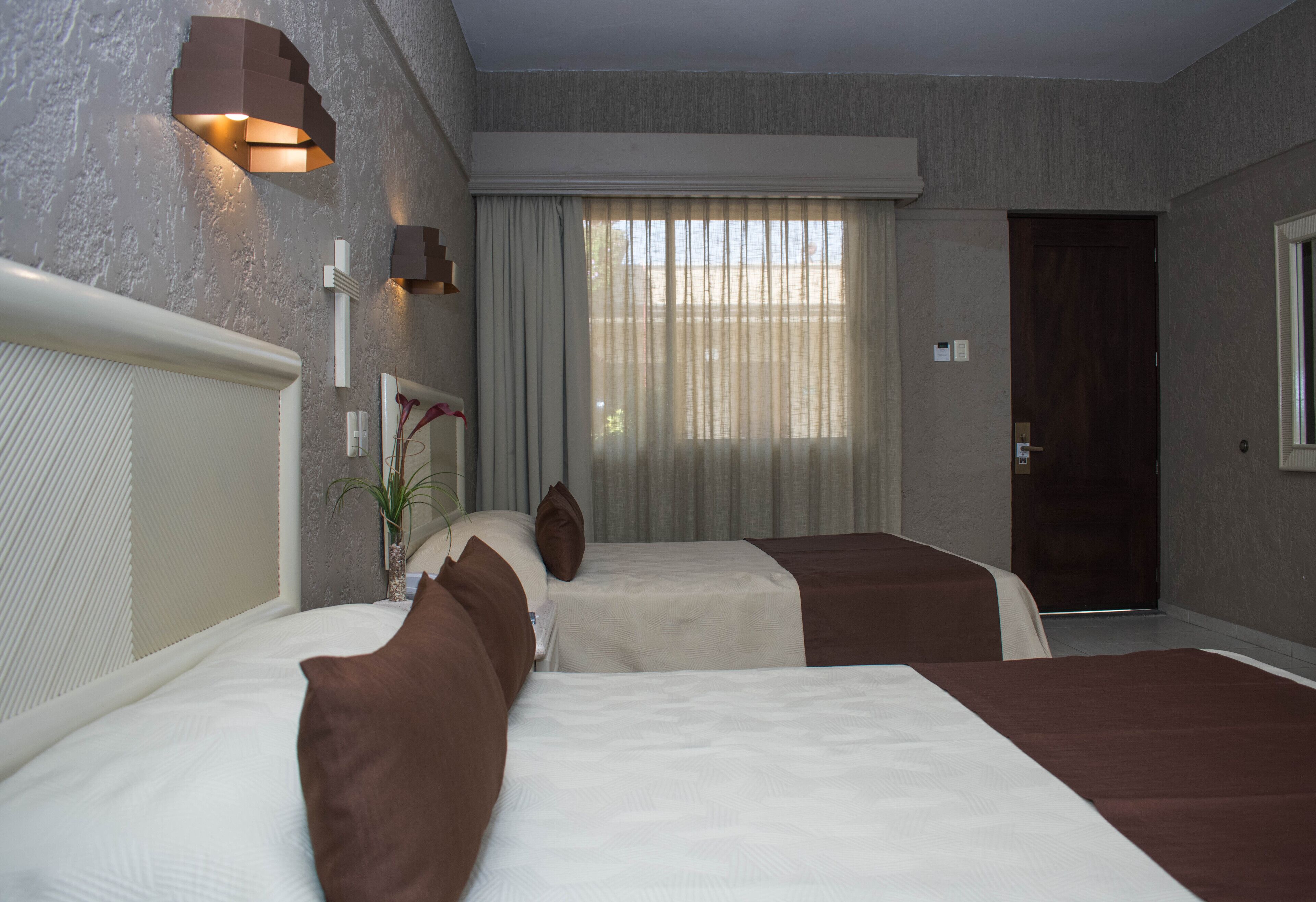 family room | frette italian sheets, premium bedding, down duvets, minibar