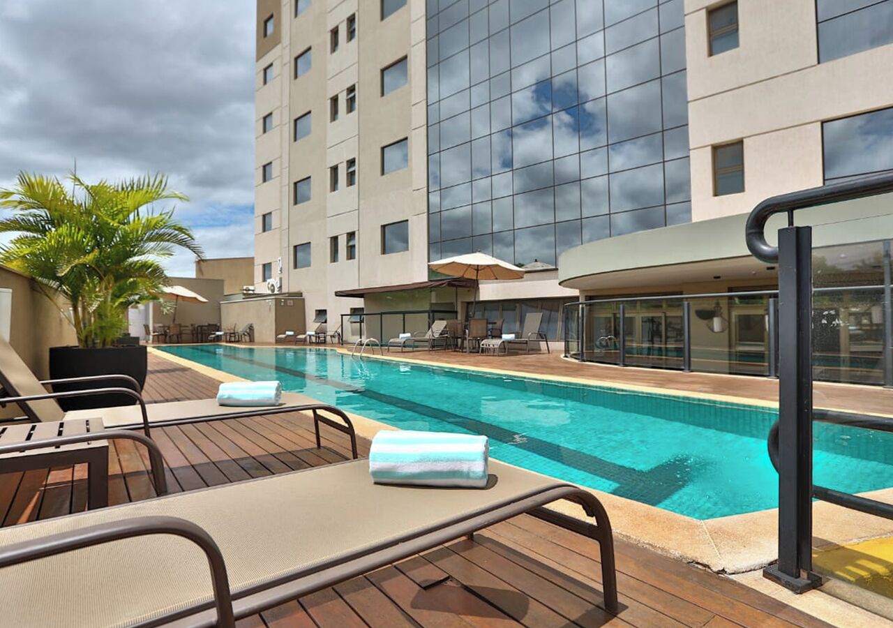 outdoor pool, pool umbrellas, pool loungers