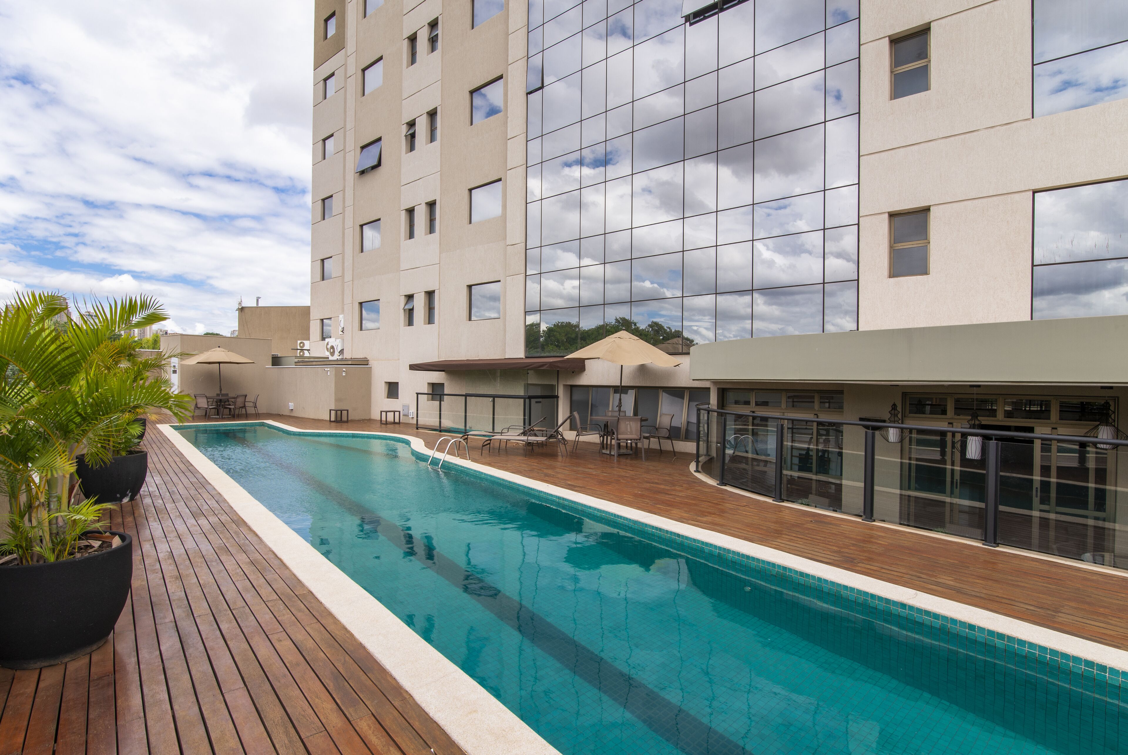 Outdoor pool, pool umbrellas, sun loungers