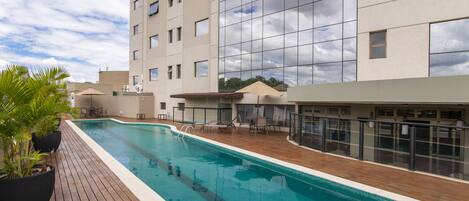 Outdoor pool, pool umbrellas, pool loungers