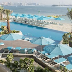 Outdoor pool, pool umbrellas, sun loungers