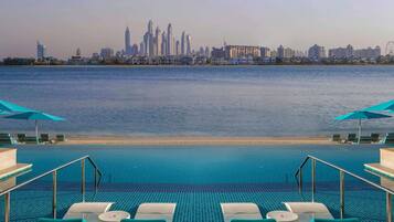 Outdoor pool, pool umbrellas, pool loungers