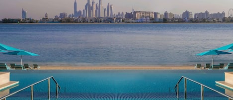 Outdoor pool, pool umbrellas, pool loungers
