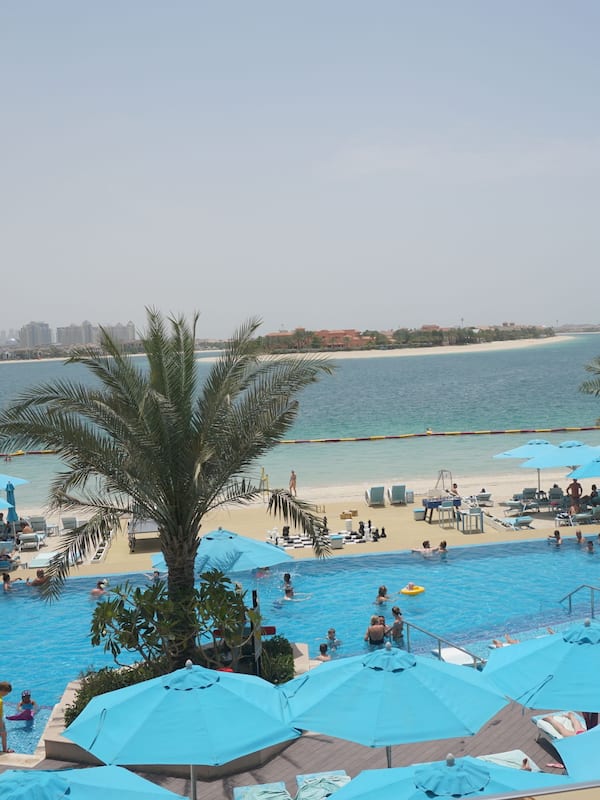 On the beach, sun loungers, beach umbrellas, beach towels