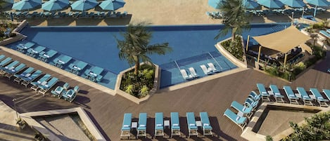 Outdoor pool, pool umbrellas, sun loungers