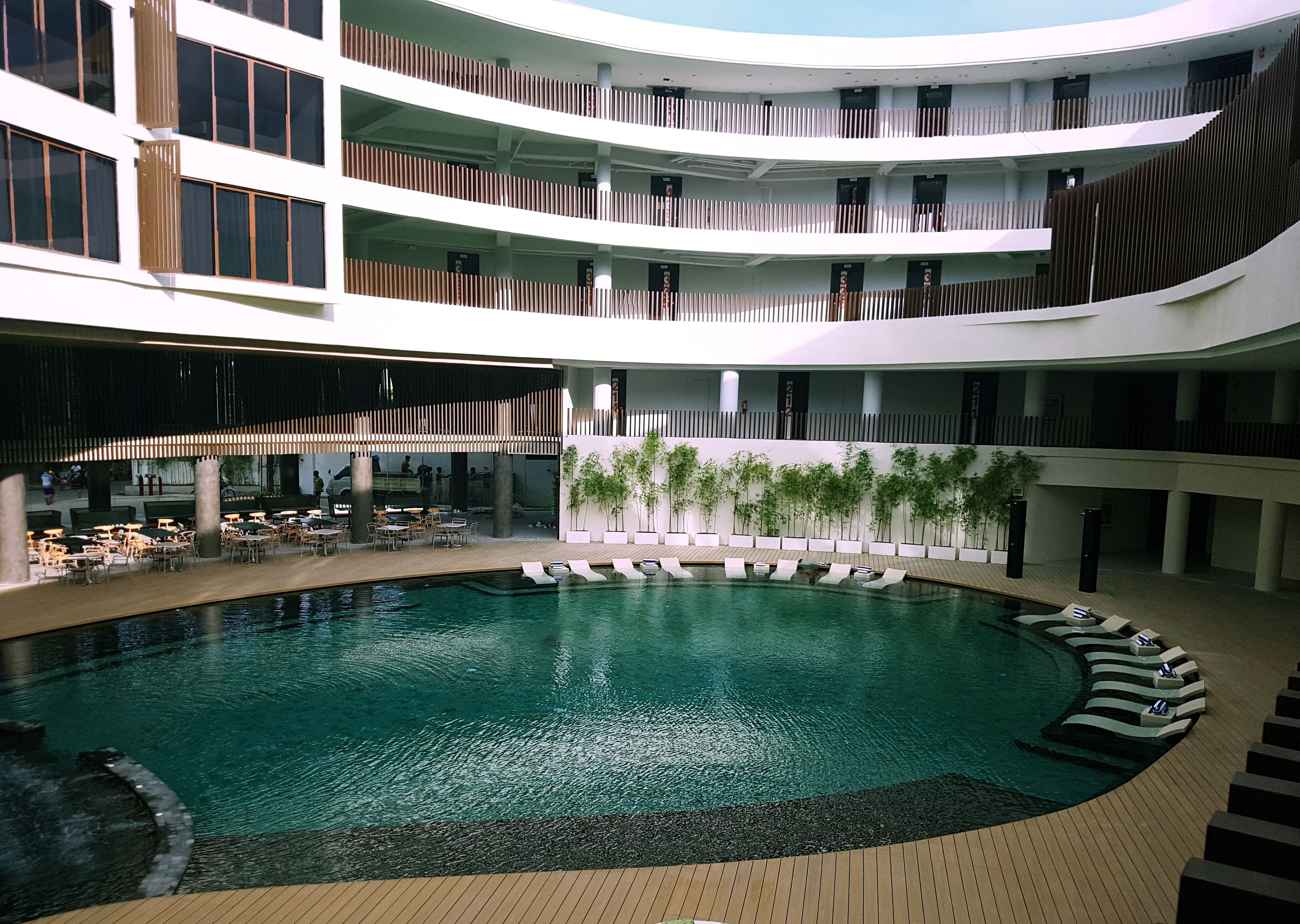 indoor pool, open 9 am to 10 pm, pool umbrellas, pool loungers