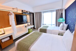 Family Room | Minibar, in-room safe, individually decorated, individually furnished