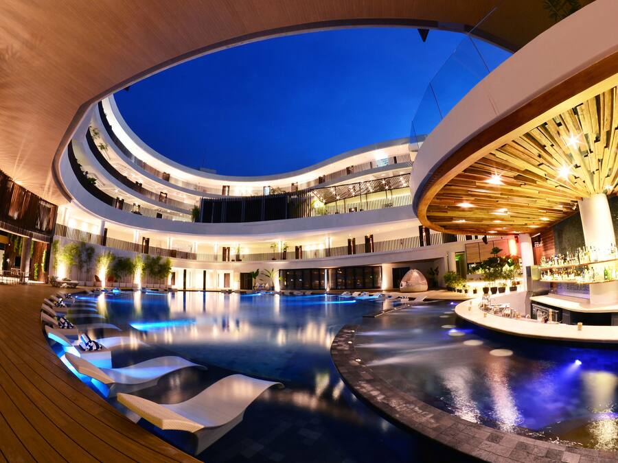 Indoor pool, outdoor pool, open 9 AM to 9:00 PM, pool umbrellas