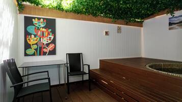 Exclusive Studio Suite, 1 Queen Bed, Hot Tub, Ground Floor | 1 bedroom, iron/ironing board, free WiFi, bed sheets