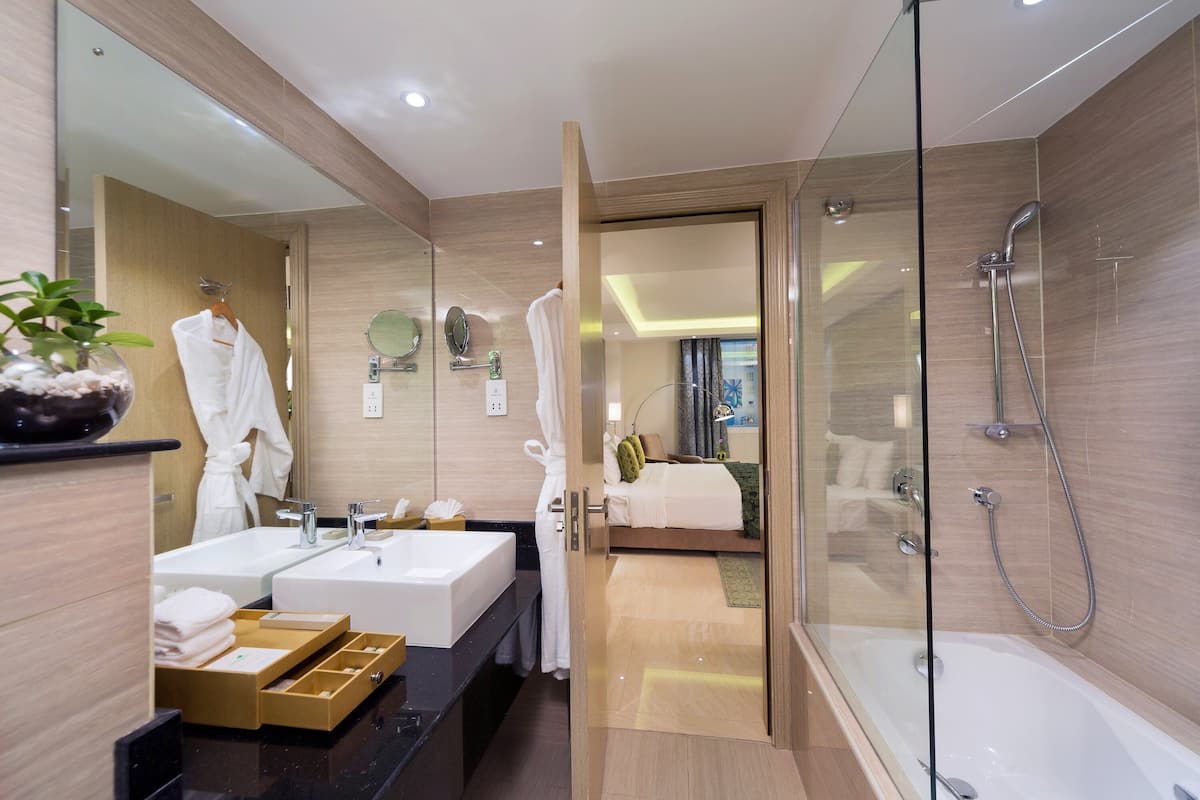 business superior suite | bathroom | shower, rainfall showerhead, free toiletries, hair dryer