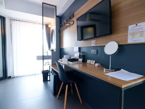 Ropa de cama de alta calidad y minibar con artículos gratuitos 