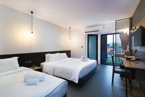 Habitación familiar | Ropa de cama de alta calidad y artículos del minibar gratis