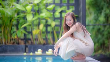 Outdoor pool, open 7 AM to 8 PM, pool umbrellas, pool loungers