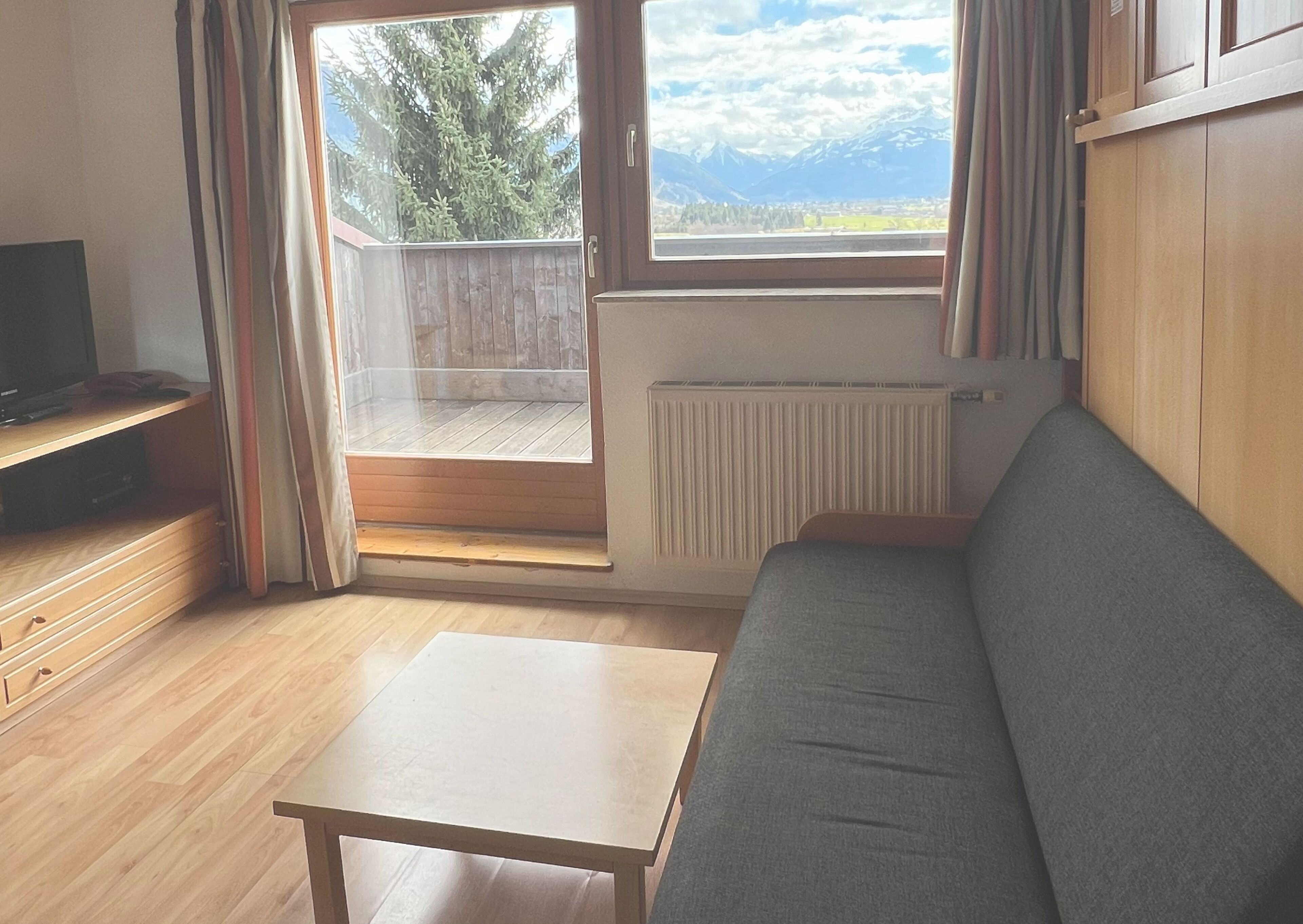 comfort apartment | living area | 32-inch flat-screen tv with satellite channels, tv