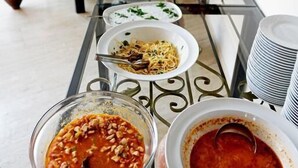 A buffet table with various dishes and a large bowl of soup. - Eon Dalyan Boutique Hotel (Ortaca)