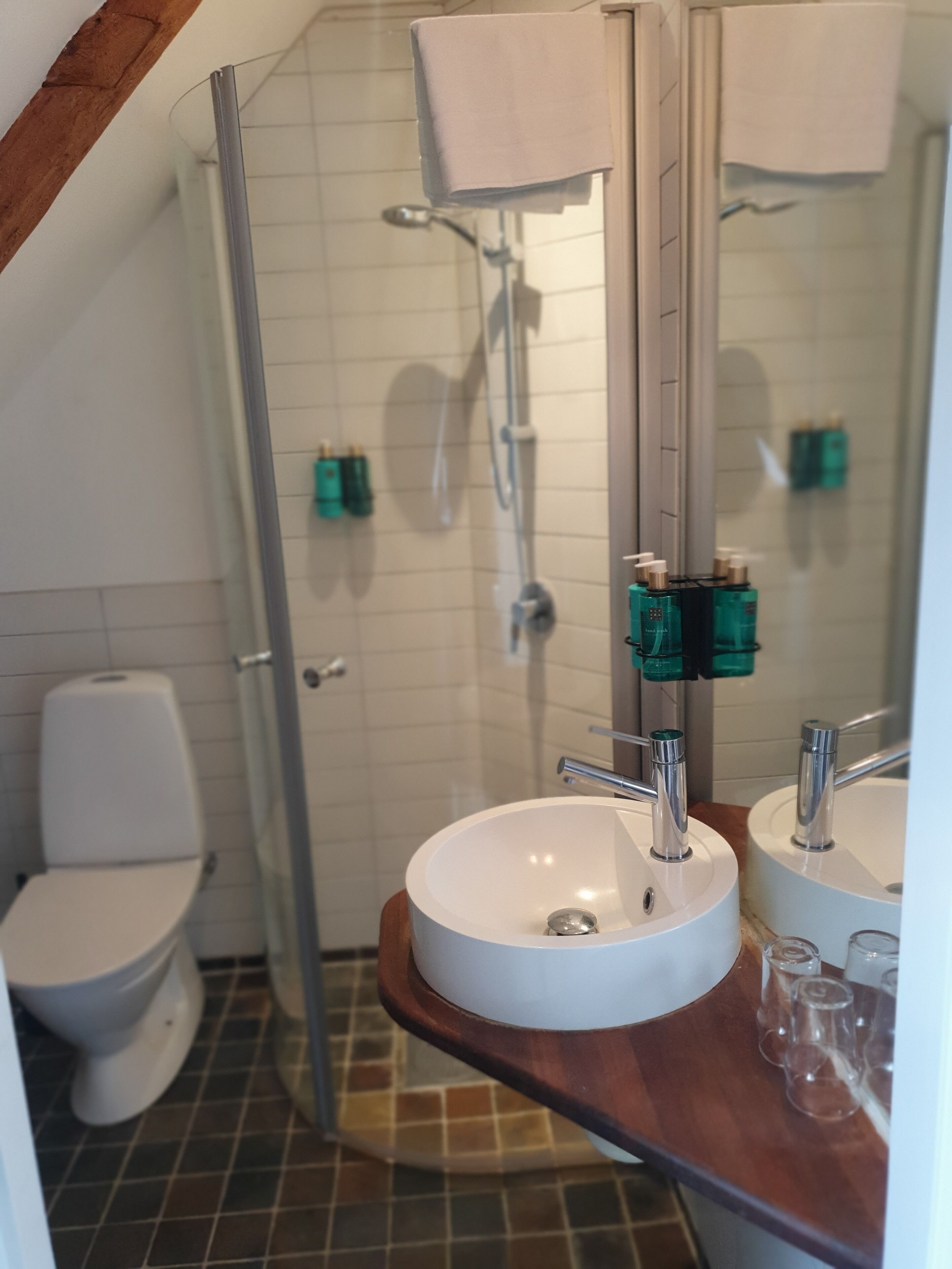mini suite | bathroom | shower, free toiletries, hair dryer, bathrobes