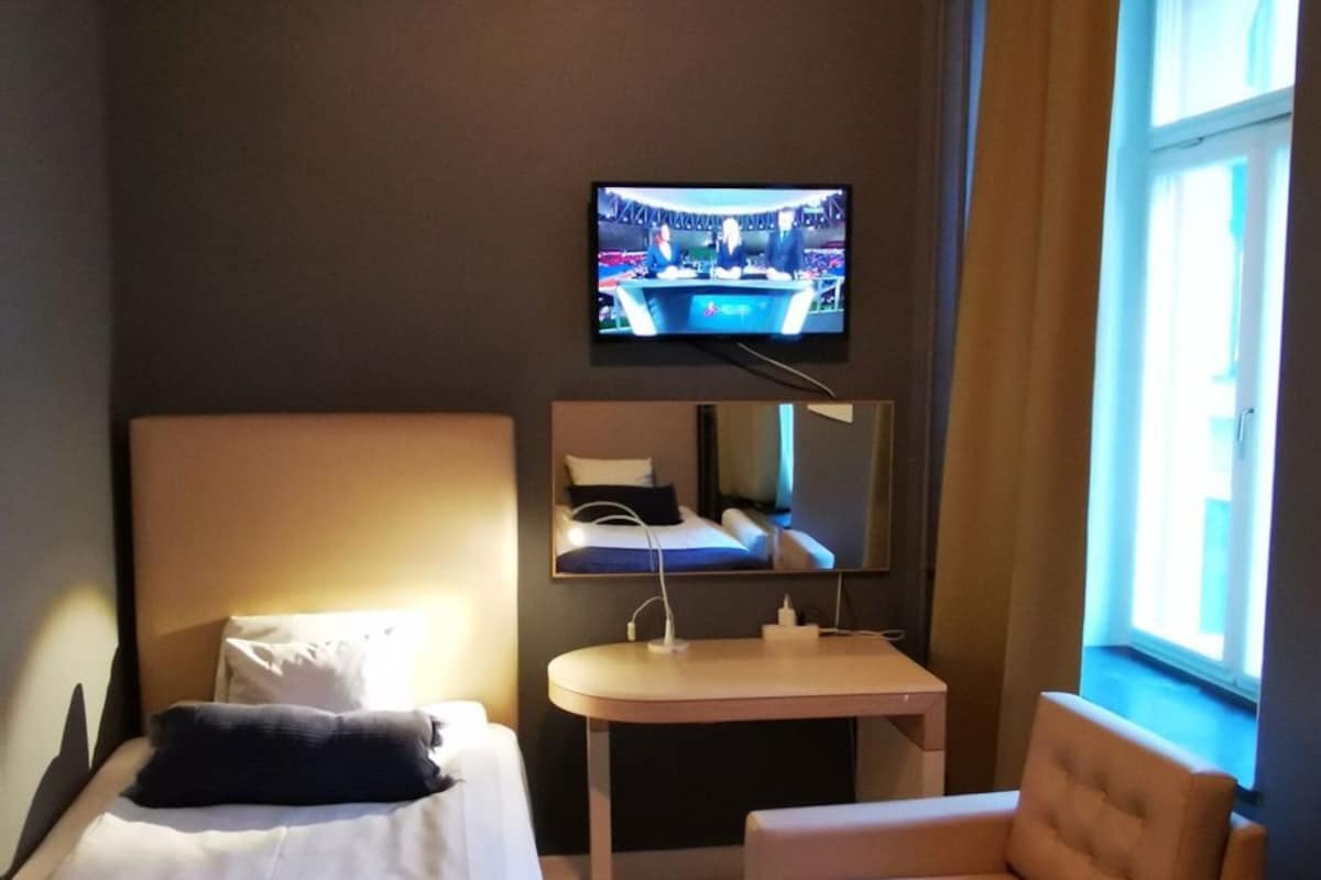 Desk, blackout drapes, WiFi (free), bed sheets