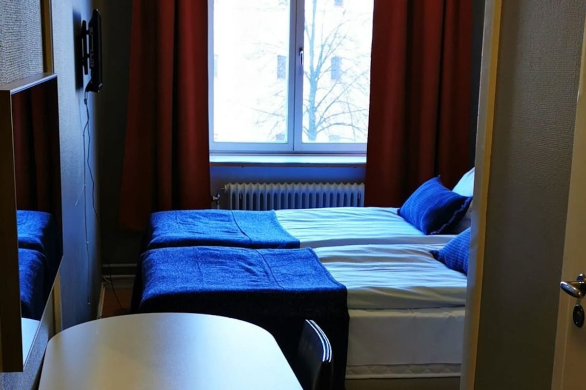 Desk, blackout drapes, WiFi (free), bed sheets