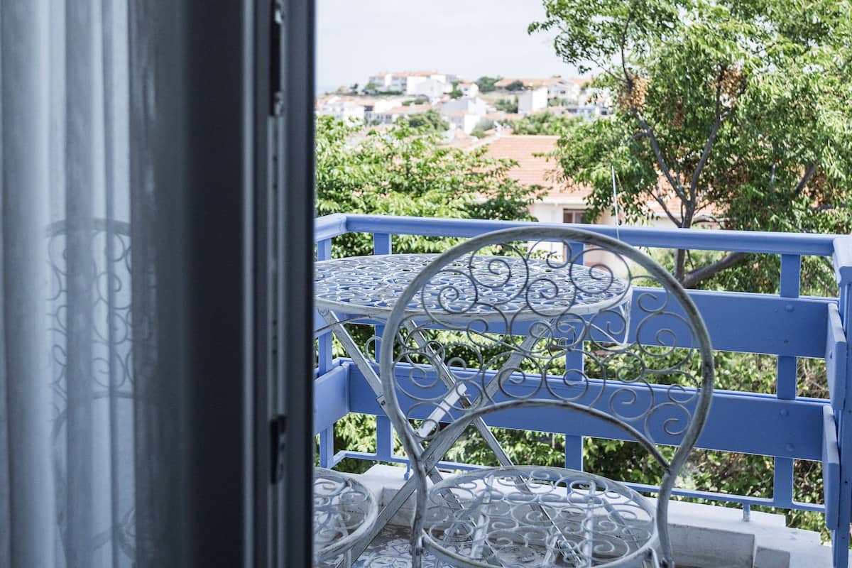Deluxe Double Room, Balcony, Partial Sea View | Minibar, in-room safe, desk, free WiFi