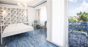Deluxe Double Room, Balcony, Partial Sea View | Minibar, in-room safe, desk, free WiFi