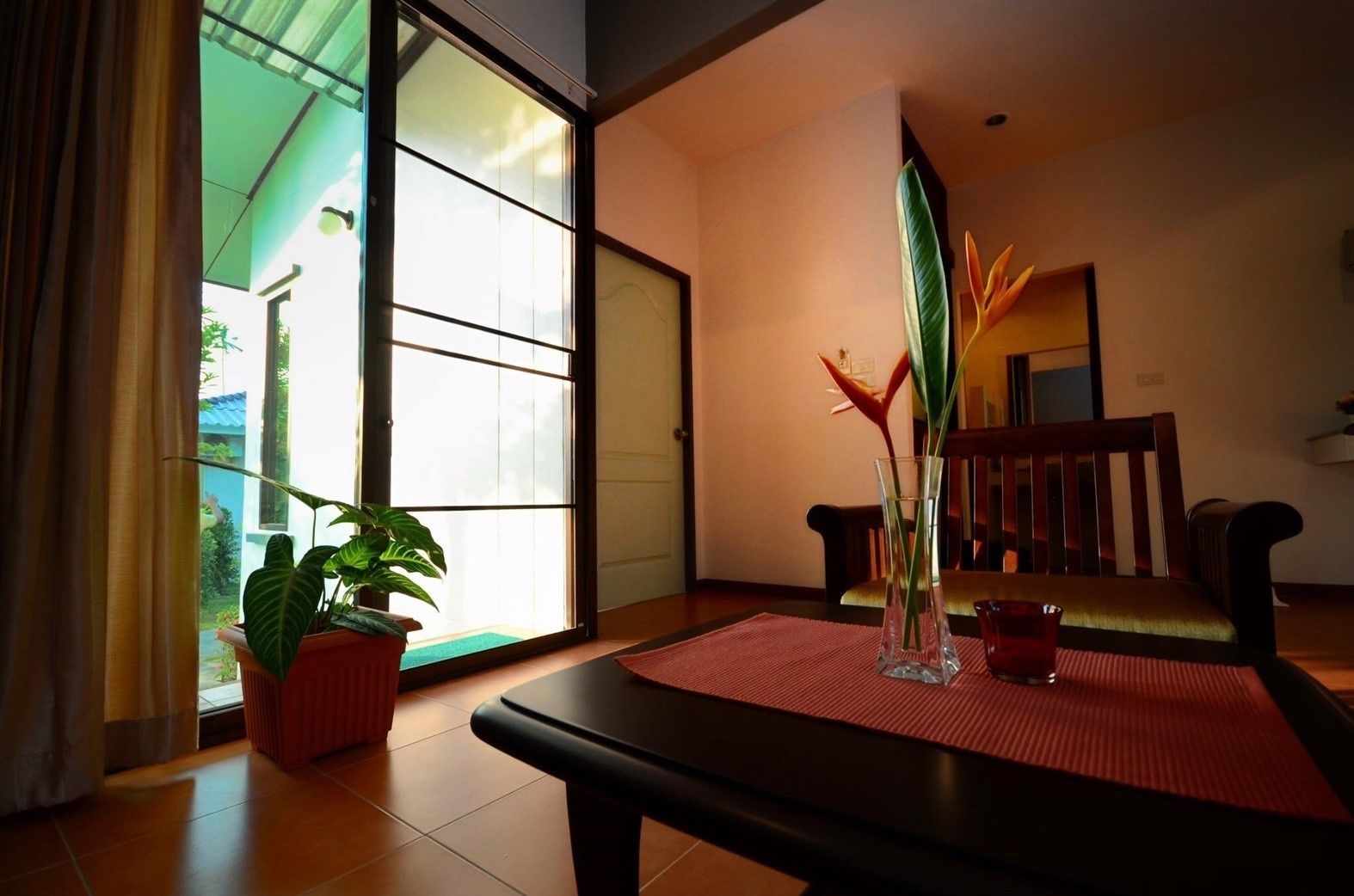 deluxe villa with king bed | living area | flat-screen tv