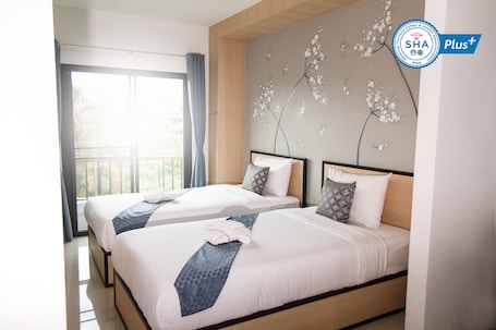 Deluxe Room, 2 Twin Beds, Balcony | Individually decorated, desk, free WiFi, bed sheets. Sirimunta Hotel Chiang Rai