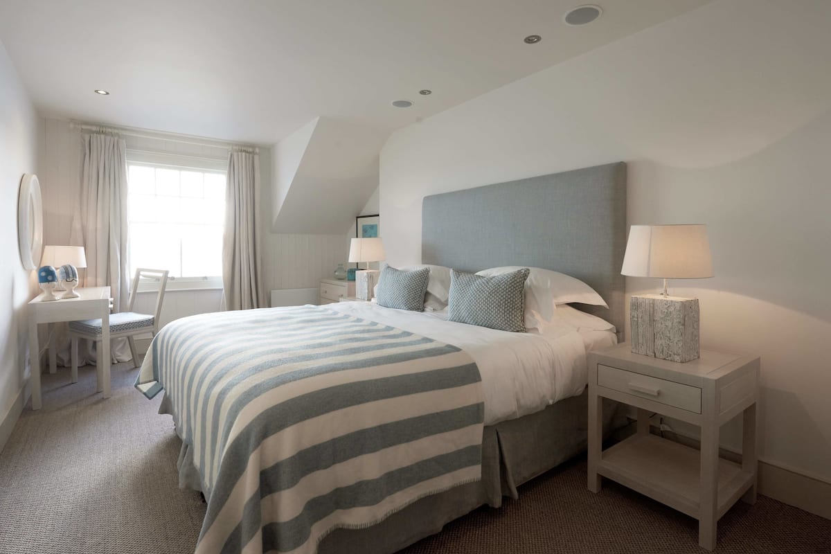 Premium bedding, desk, iron/ironing board, rollaway beds