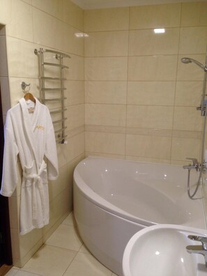 Shower, free toiletries, hair dryer, slippers