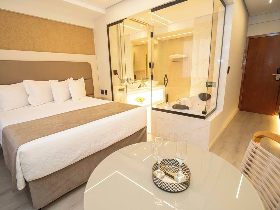 Suite Executiva com Banheira de Hidromassagem. | Minibar, desk, blackout curtains, free WiFi