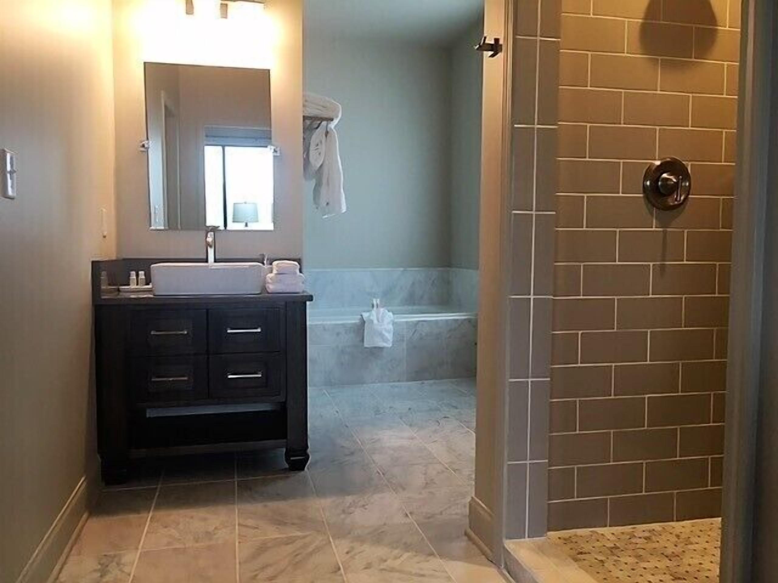 penthouse, 1 king bed with sofa bed (east grand penthouse) | bathroom | separate bathtub and shower, jetted bath, free toiletries, hair dryer