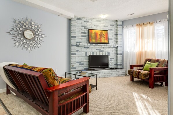 Apartment, 4 Schlafzimmer, Kamin | Wohnbereich