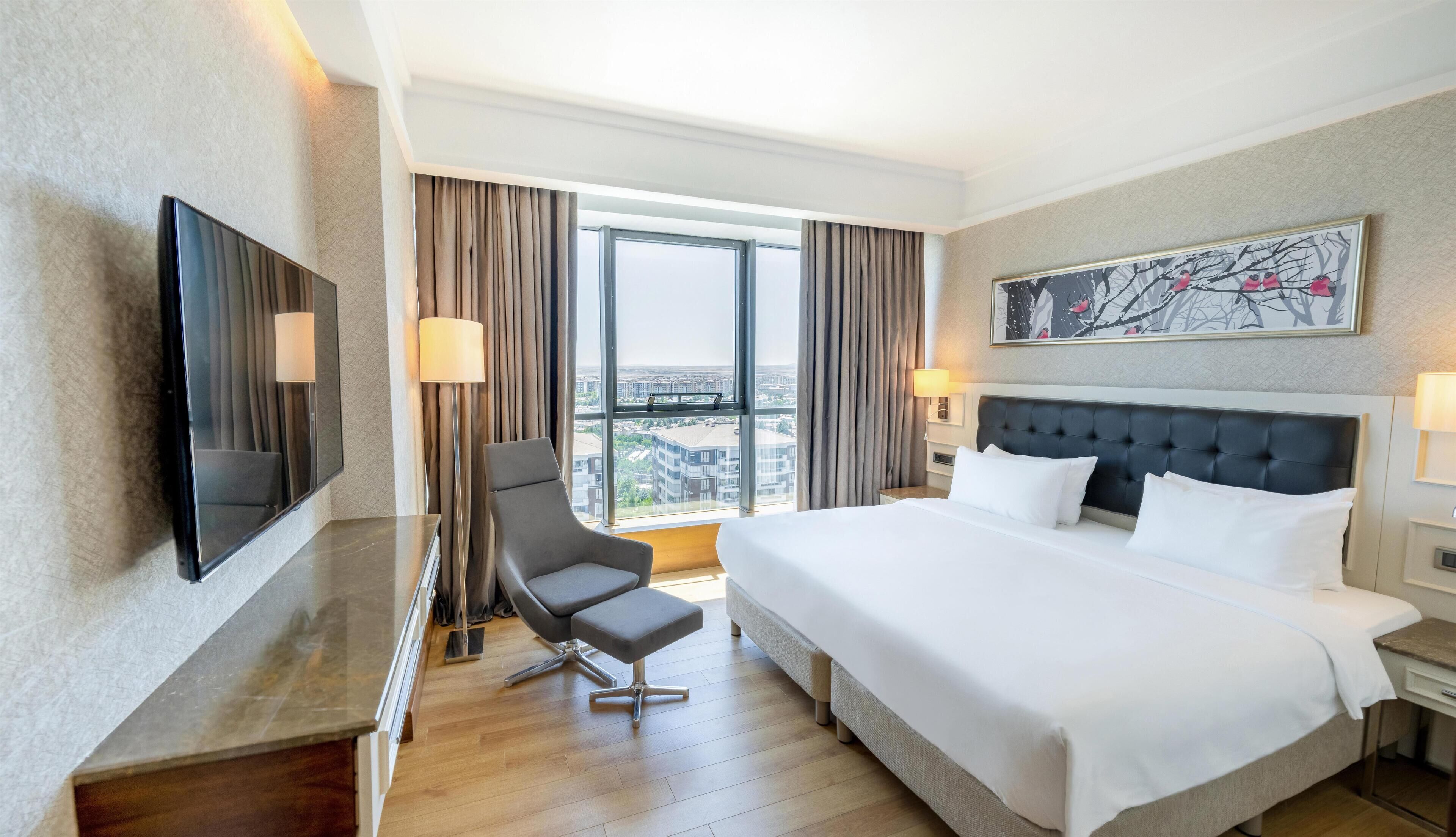 Habitación (Guest) | Ropa de cama de alta calidad y minibar 