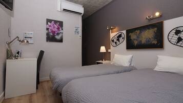 Chambre Standard avec lits jumeaux | Bureau, chambres insonorisées, lits bébé (en supplément), Wi-Fi gratuit