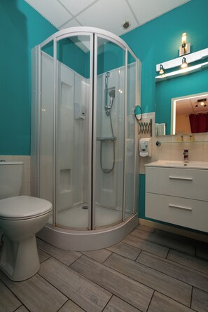 Shower, free toiletries, hair dryer, towels